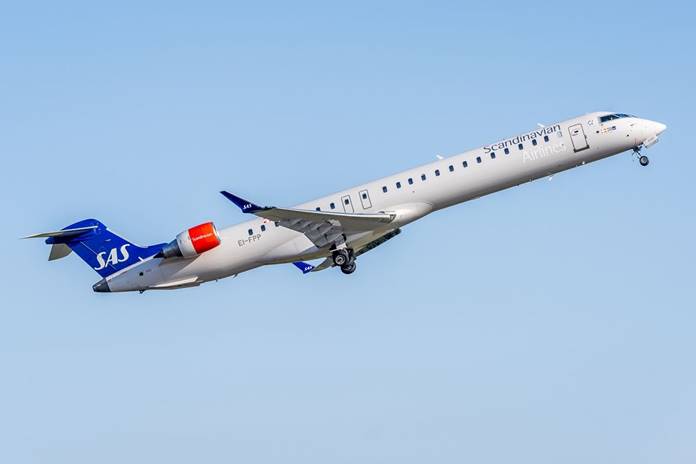 „SAS - Scandinavian Airlines“ orlaivis, jungiantis Palangą su Kopenhaga, švenčia dvidešimties metų skrydžių jubiliejų